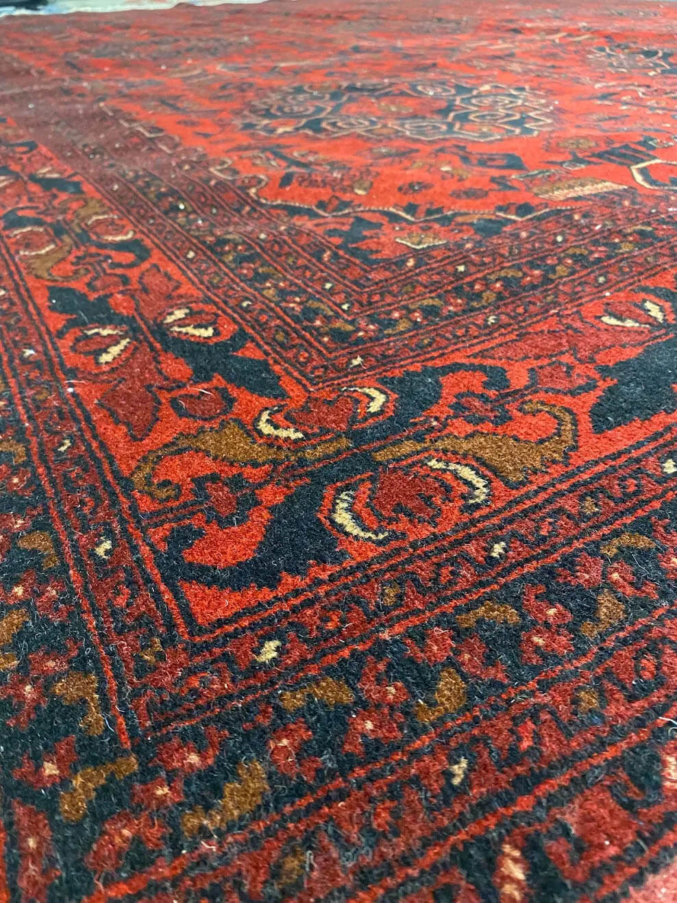 Area rug with abrash on wash floor