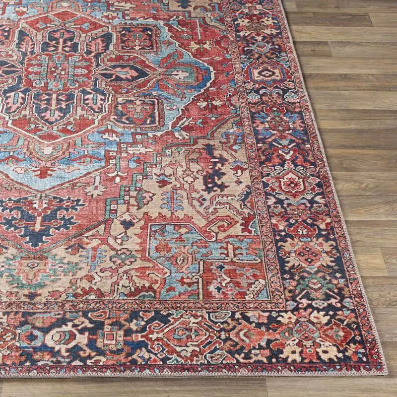 faded rug on wood flooring